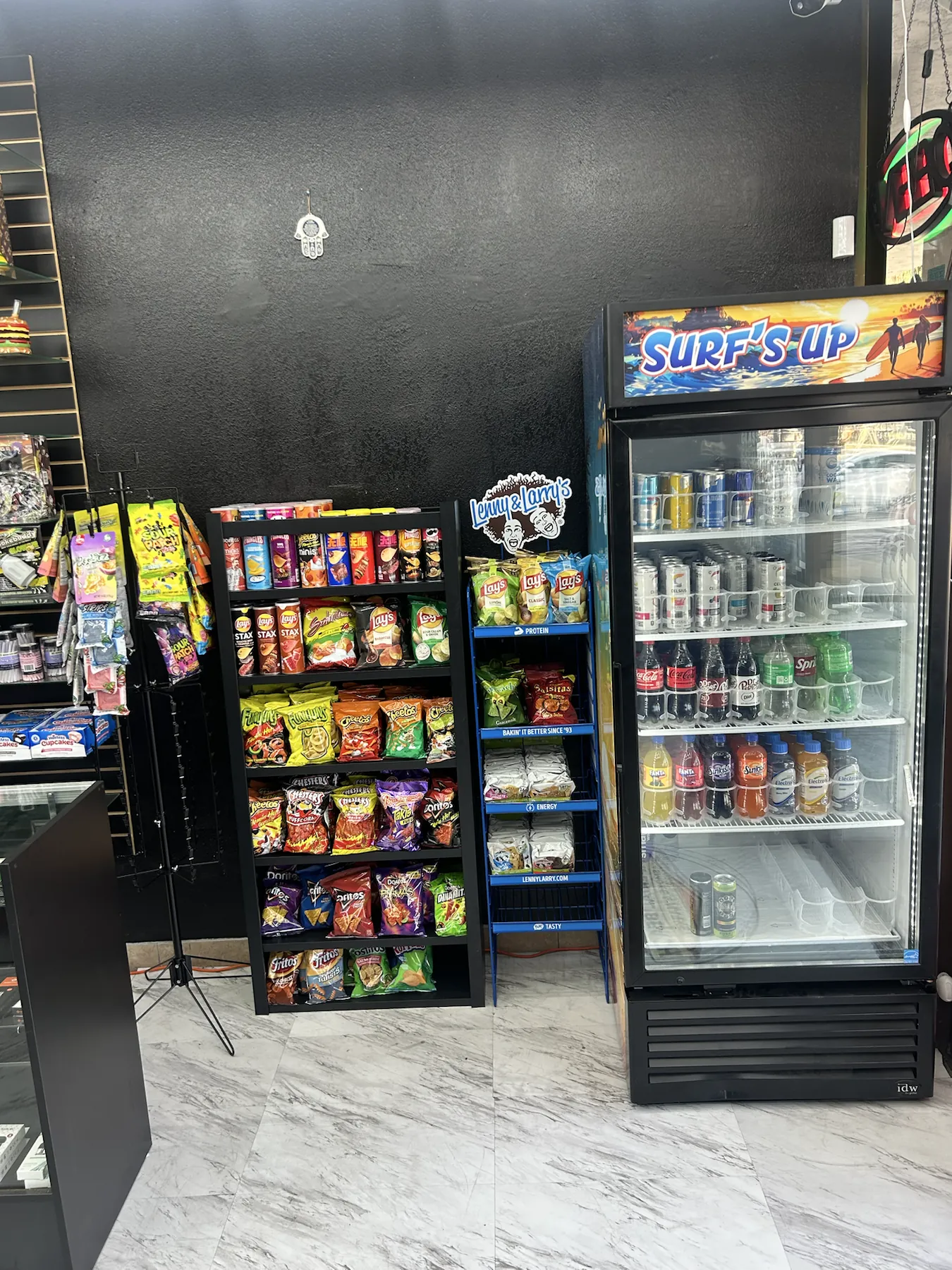 Snack shelves and cold drinks available at Imperial Beach Smoke & Market